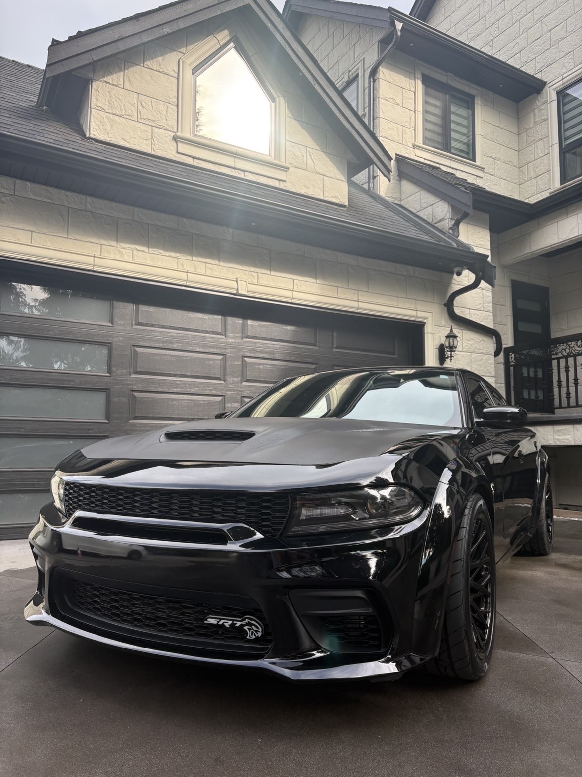 Black Dodge Charger SRT with a deep gloss finish